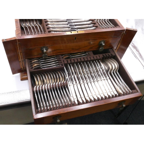 235 - An Argyle silver plated 12 place setting flatware service in fitted oak canteen with hinged lid and ... 