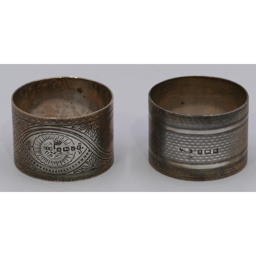 237 - A Victorian Sheffield silver napkin ring with engraved decoration and a similar Birmingham silver na... 