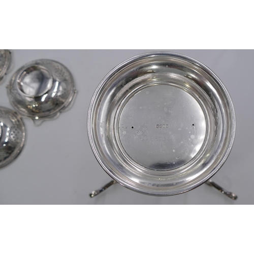 238 - A silver plated centre comport with round detachable pierced bowl, surrounded by 3 smaller pierced r... 