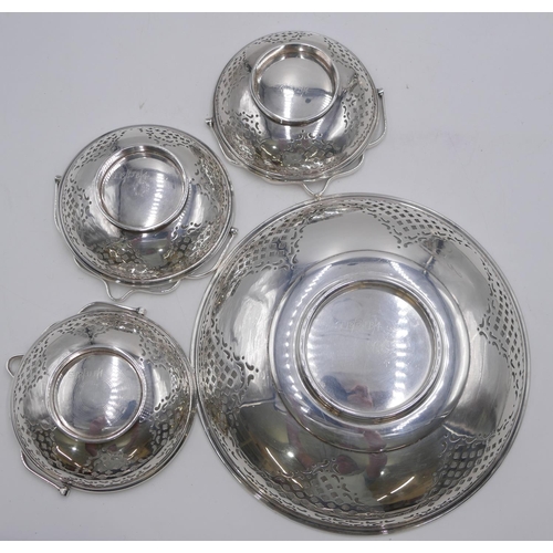 238 - A silver plated centre comport with round detachable pierced bowl, surrounded by 3 smaller pierced r... 