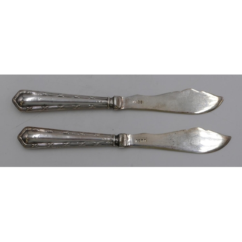 239 - A pair of Birmingham silver handled butter knives in fitted black leather case.