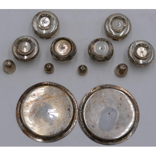 250 - A pair of silver coloured metal small round dishes with engraved decoration and 6 similar miniature ... 