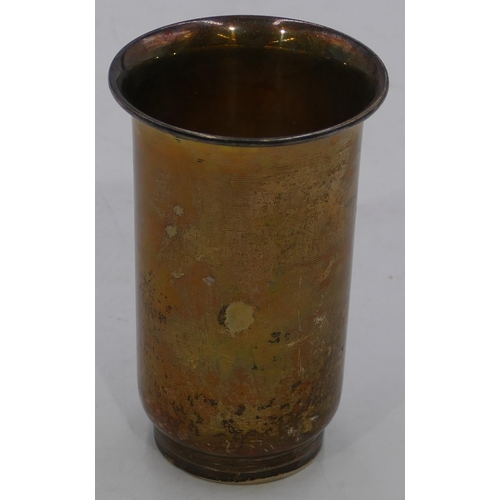 254 - An 830 silver gilt coloured metal round trumpet shaped beaker with engraved building and inscription... 