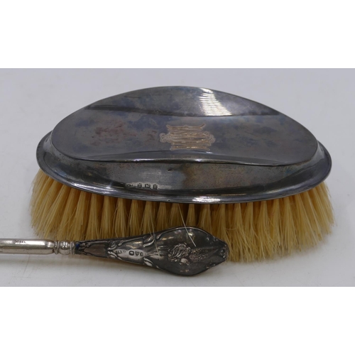 258 - A Birmingham oval gentleman's hairbrush, a pair of silver handled small scissors and 2 silver handle... 