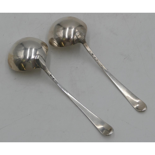 269 - A pair of Georgian silver sauce ladles with bright cut decoration (marks rubbed) 2.9oz