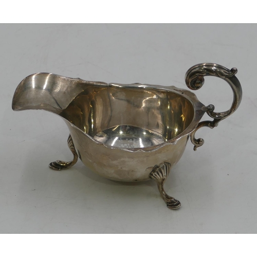 270 - A Birmingham silver sauceboat with crickle rim, scroll handle and splayed feet 2.6oz