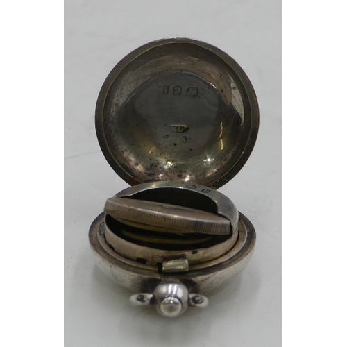 280 - A Victorian Birmingham silver round bulbous shaped sovereign case with hinged front and engraved dec... 