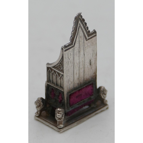 285 - A miniature Birmingham silver pin cushion in the form of a throne, 4cm high