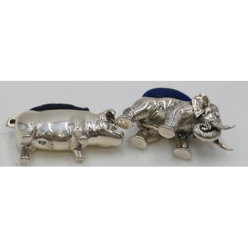 290 - A Sterling silver small pin cushion in the form of an elephant and another silver pin cushion in the... 