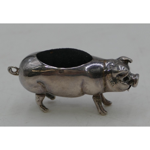 291 - A 925 silver pin cushion in the form of a pig, 5.2cm long