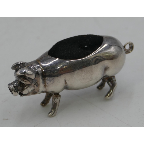 291 - A 925 silver pin cushion in the form of a pig, 5.2cm long