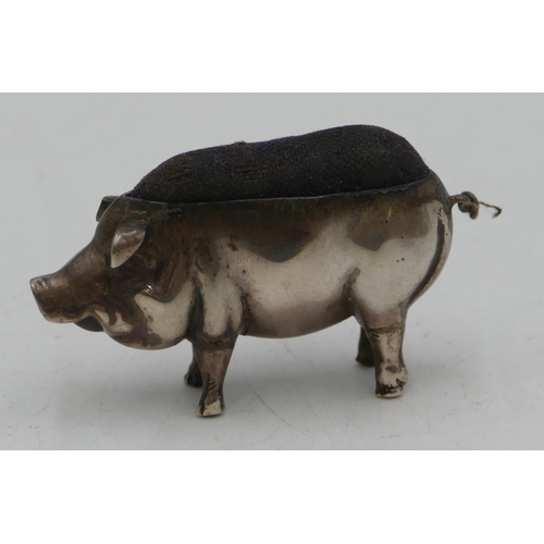 292 - A Birmingham silver pin cushion in the form of a pig (marks rubbed) 5.5cm long