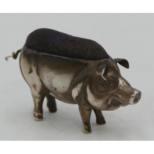 292 - A Birmingham silver pin cushion in the form of a pig (marks rubbed) 5.5cm long