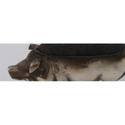 292 - A Birmingham silver pin cushion in the form of a pig (marks rubbed) 5.5cm long