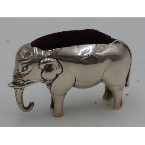 294 - An Edward VII silver pin cushion in the form of an elephant, Chester 1908, 6.2cm long