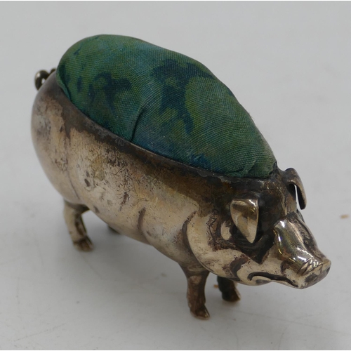 295 - An Edward VII silver pin cushion in the form of a pig, Birmingham 1905, 6.6cm long