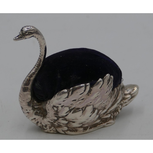 296 - A late Victorian exported silver pin cushion in the form of a swan, London 1896, 6cm high