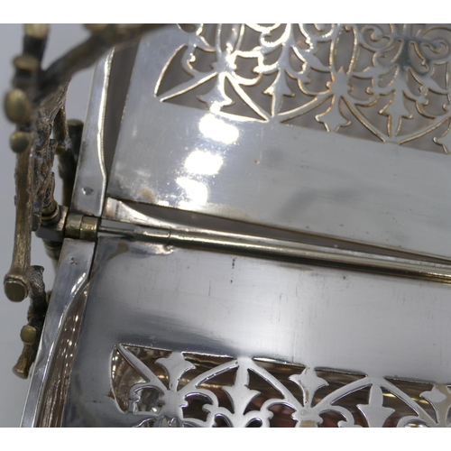 301 - A silver plated folding breakfast dish with hinged double sides, on branch shaped supports and splay... 