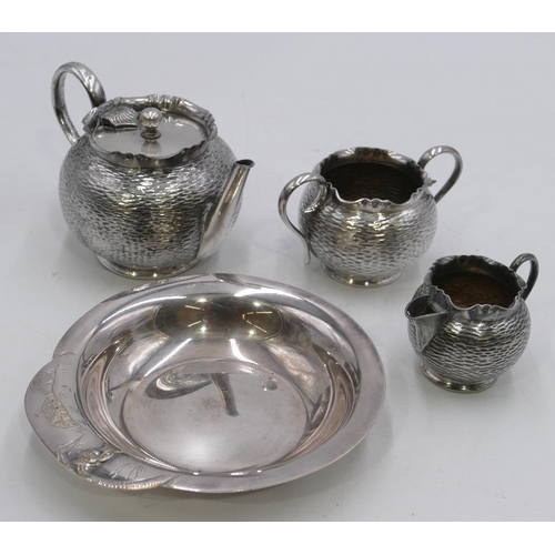 302 - A silver plated round bulbous shaped batchelor's tea service after Dresser, teapot, milk jug and 2-h... 