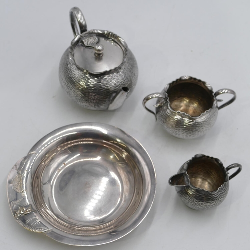 302 - A silver plated round bulbous shaped batchelor's tea service after Dresser, teapot, milk jug and 2-h... 