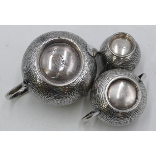 302 - A silver plated round bulbous shaped batchelor's tea service after Dresser, teapot, milk jug and 2-h... 