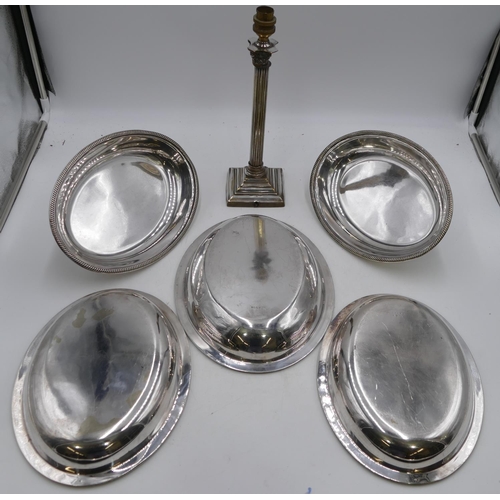 304 - A pair of silver plated oval entree dishes with covers and gadroon rims, 19cm wide, a plated entree ... 