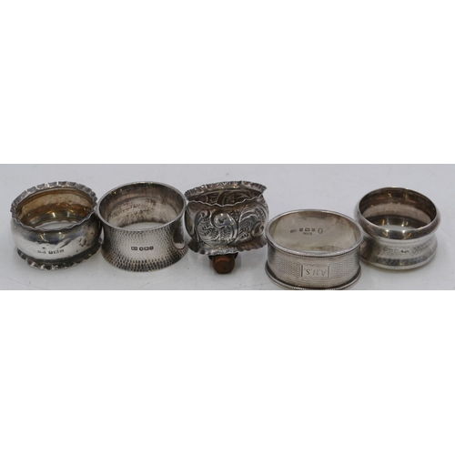 306 - A Sheffield hammered silver round napkin ring and 4 various other silver napkin rings, 3.3oz. (5)