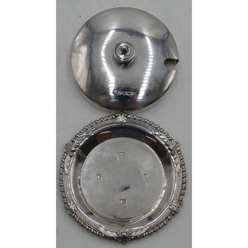 309 - A round bulbous cut glass jam pot with Sheffield silver lid (slight chip to rim), a modern Birmingha... 