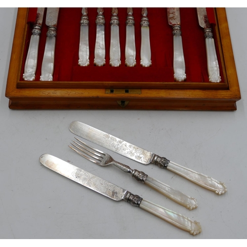 319 - A set of 12 silver plated and mother of pearl handled fruit knives, 12 knives, 12 forks in a fitted ... 