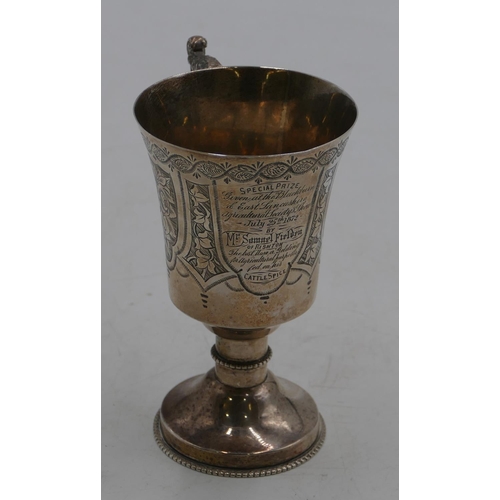 324 - A Victorian silver goblet/trophy with engraved floral and leaf decoration and inscription, Birmingha... 