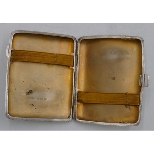 328 - A Birmingham small concave shaped cigarette case with engine turn decoration, hinged front. 9cm high... 