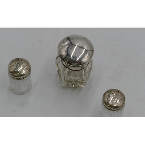 331 - A hexagonal cut glass dressing table bottle with Birmingham silver screw lid, enclosing inner stoppe... 