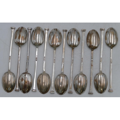 335 - A set of 12 Sheffield silver seal topped teaspoons with fitted black leather case, 3.6oz