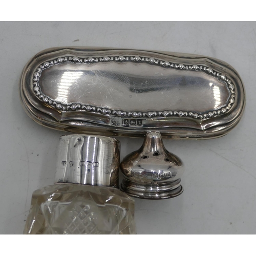 362 - A glass dressing table bottle with Birmingham silver lid, a cut glass square scent bottle with stopp... 