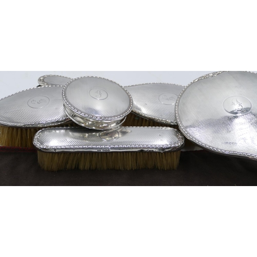 363 - A Sheffield silver 5 piece dressing table set, cut glass pot with silver lid, hand mirror and 3 brus... 