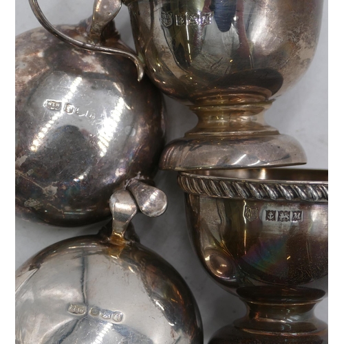 366 - A Birmingham silver round bulbous shaped mustard pot and matching salt with gadroon rim and another ... 