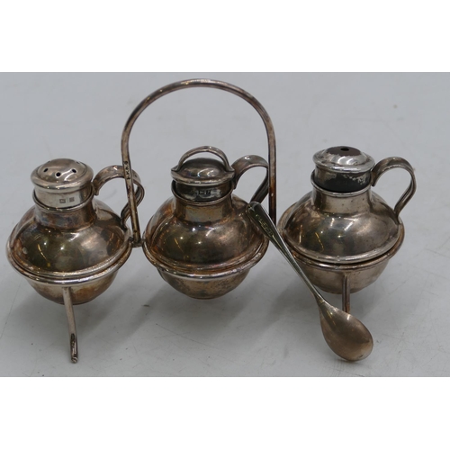 368 - A set of 3 Birmingham silver round bulbous shaped condiments in form of Jersey milk cans on silver p... 