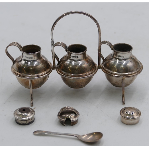 368 - A set of 3 Birmingham silver round bulbous shaped condiments in form of Jersey milk cans on silver p... 