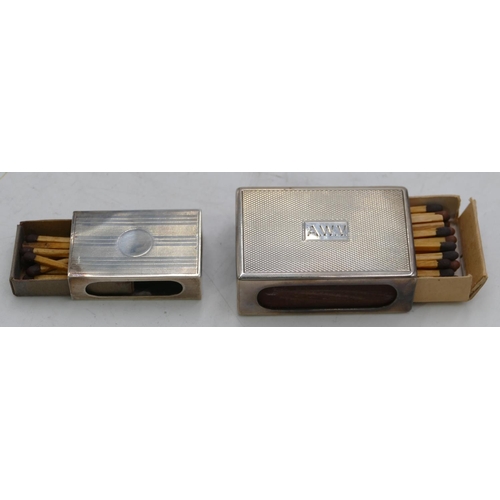 374 - A Birmingham silver rectangular shaped matchbox case holder with engine turn decoration, makers mark... 