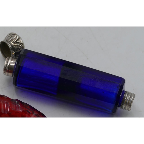 381 - A Victorian blue glass decagon double ended scent bottle with hinged and screw silver ends (no inner... 