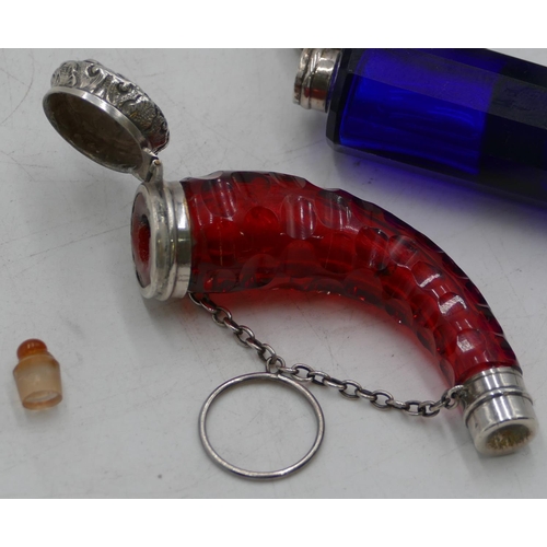 382 - A Victorian ruby glass and silver cornucopia scent bottle with thumb pattern decoration with embosse... 