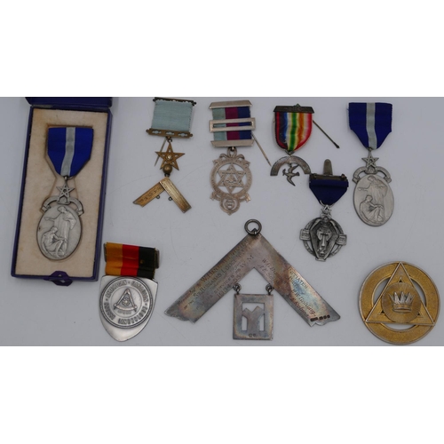 399 - 9 silver Masonic medals and badges, some with ribbons, overall weight 363.2 grams gross.