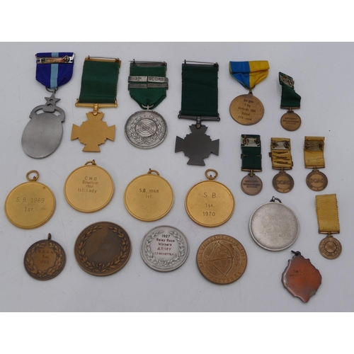 408 - 20 various gilt metal, brass and silver archery medals, some with enamelled decoration.