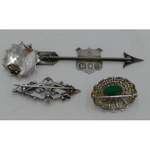 420 - A silver brooch in form of an arrow and 3 other silver brooches, 19 grams gross. (4)