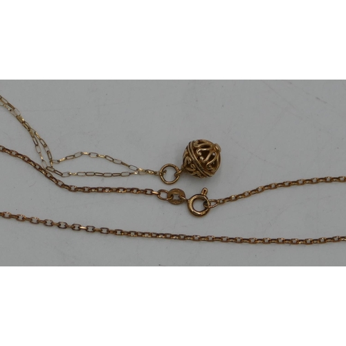 428 - A gold circular pendant with chain and a 9ct gold chain, 4.6 grams. (2).