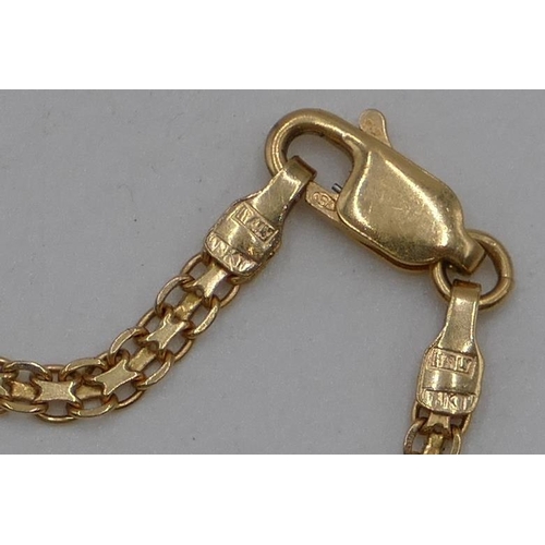 464 - An 18ct gold flat linked chain, 62cm long, 7.7 grams.