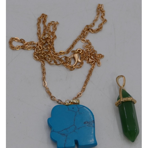 467 - A lapis lazuli style pendant in form of an elephant with chain and a green hardstone pendant with ch... 