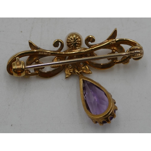 480 - A 9ct gold scroll brooch mounted with cultured pearls and amethyst drop, 3.5cm wide