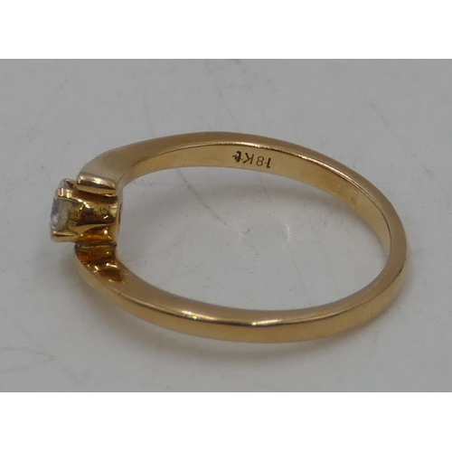 485 - An 18ct gold small solitaire diamond ring, approx. 0.20ct, Size N/O