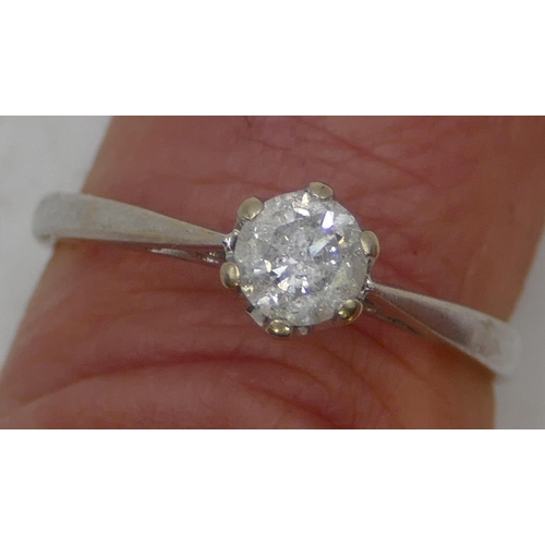 491 - An 18ct white gold solitaire diamond ring, approx. 0.60ct, Size O/P